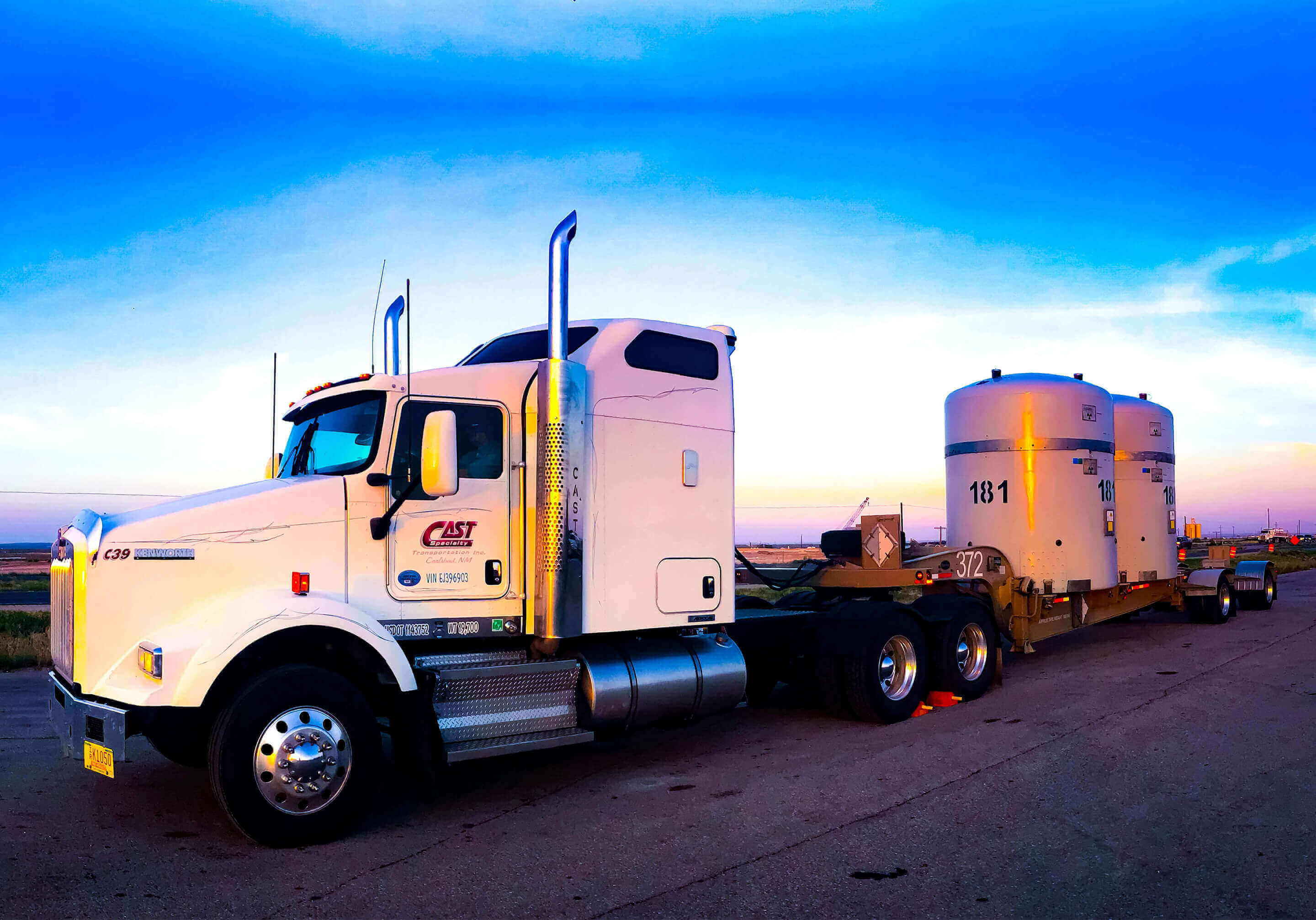 Semi Truck with trailer hauling two TRUPACT-II containers